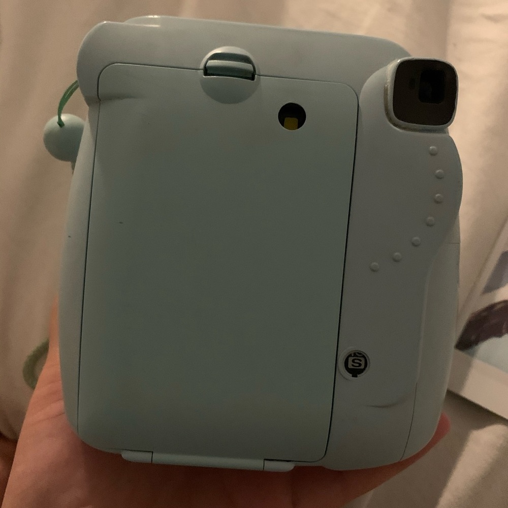 blue polaroid camera